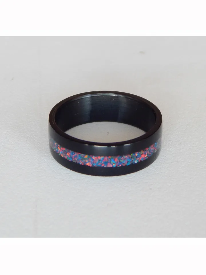 Stylish black ring. Carbon ring with synthetic opal. 10 1/2