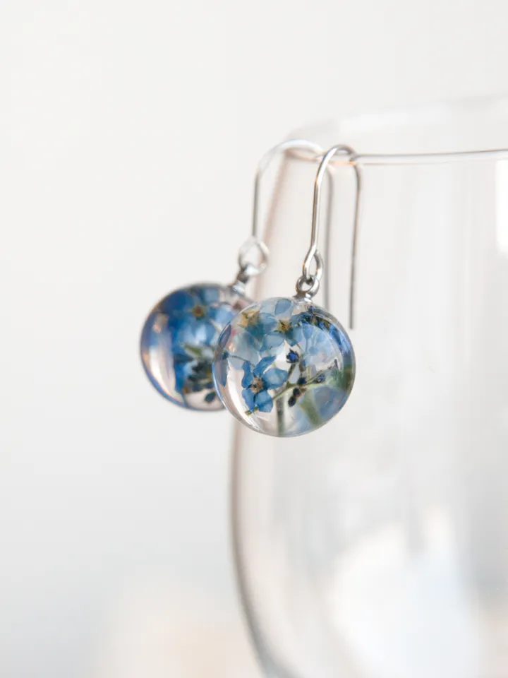 Forget-me-not sphere earrings. Blue dangle resin earrings