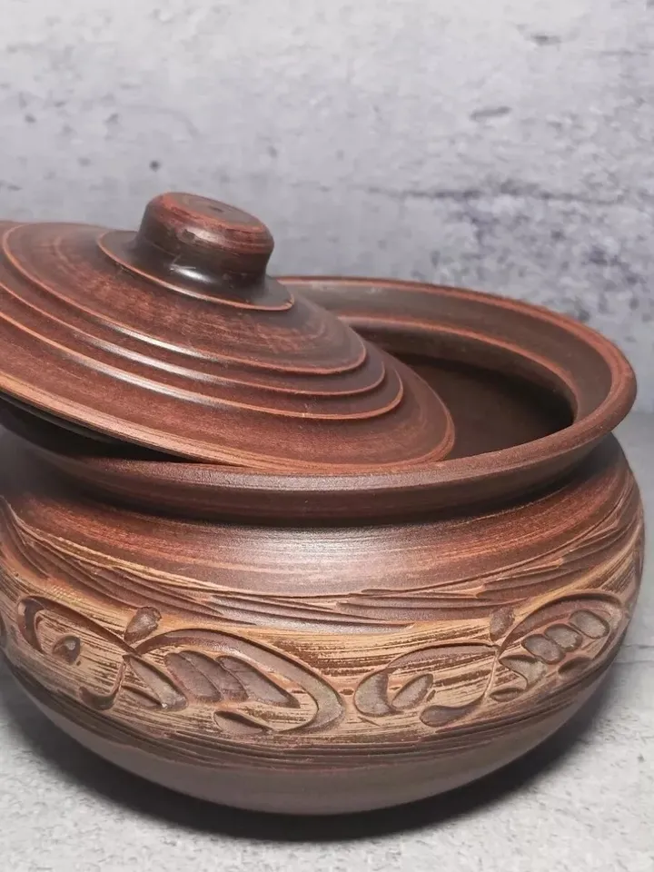 Pottery casserole. Handmade from red clay, carved pattern. Eco-friendly product