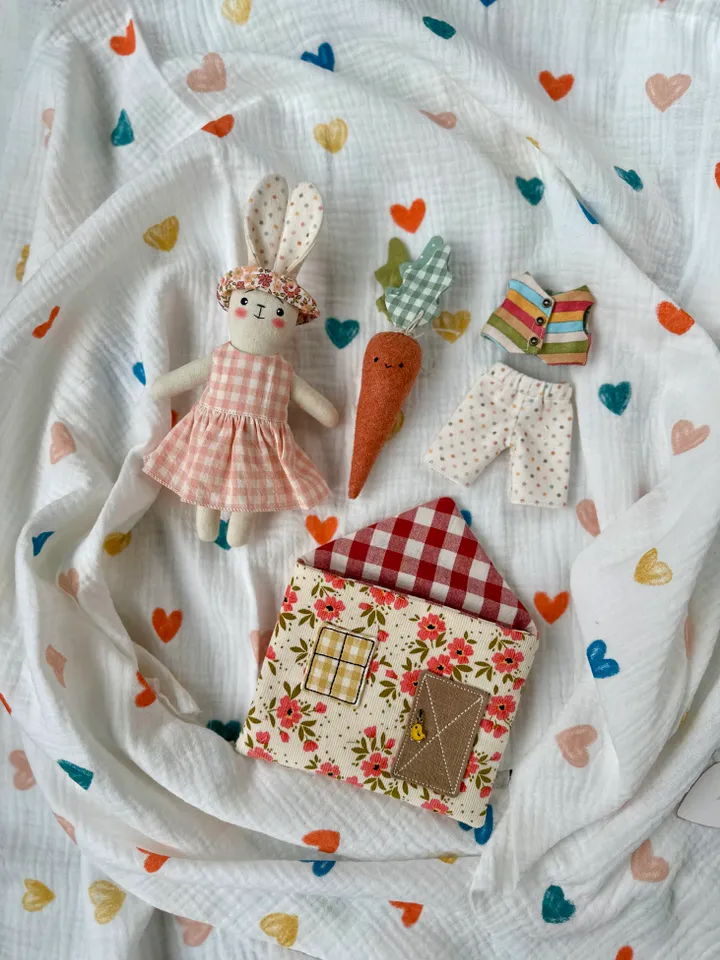 Sewing pattern hare with clothes and house