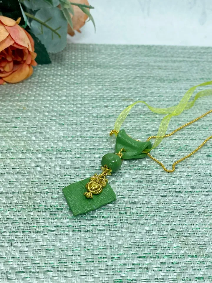 Handmade pendant on a chain. Handmade jewelry.