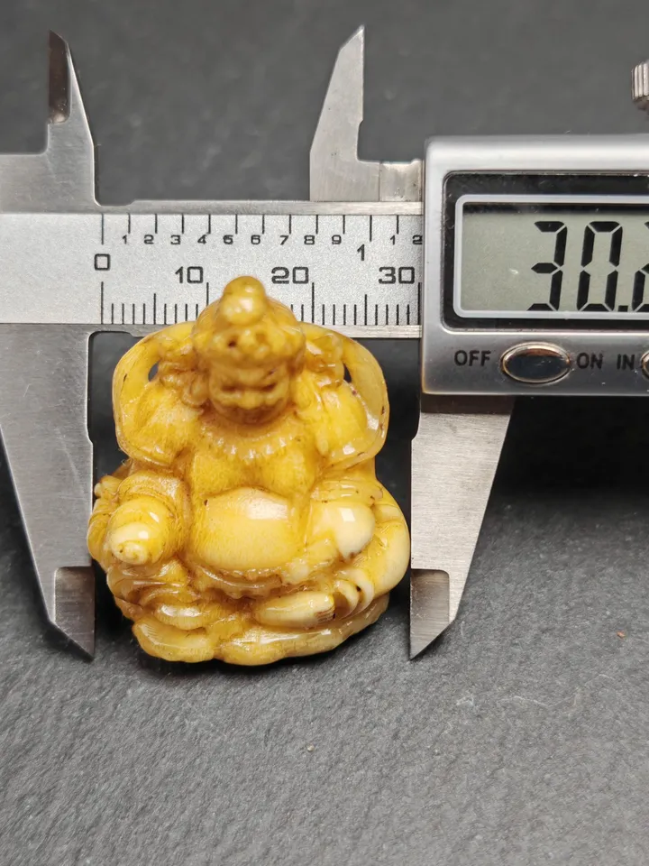 Gandhanra Antique Consecrated Tibetan Buddha statue - Yellow Jambhala(Dzambhala),Carved from Deer Antlers,40mm × 30mm × 20mm