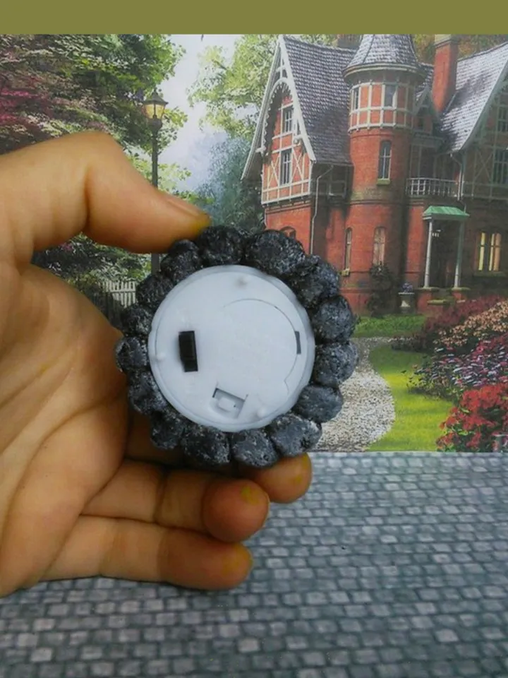 Bonfire with lighting. Dollhouse miniature 1:12. Realistic fire. LED candle. Fire for a doll's garden.