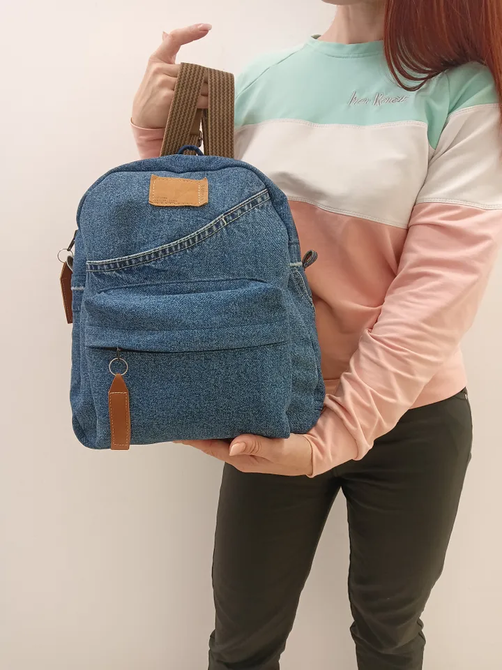 Stylish Denim backpack with 100 percent cotton lining, handmade, jeans recycling, 6 pockets.