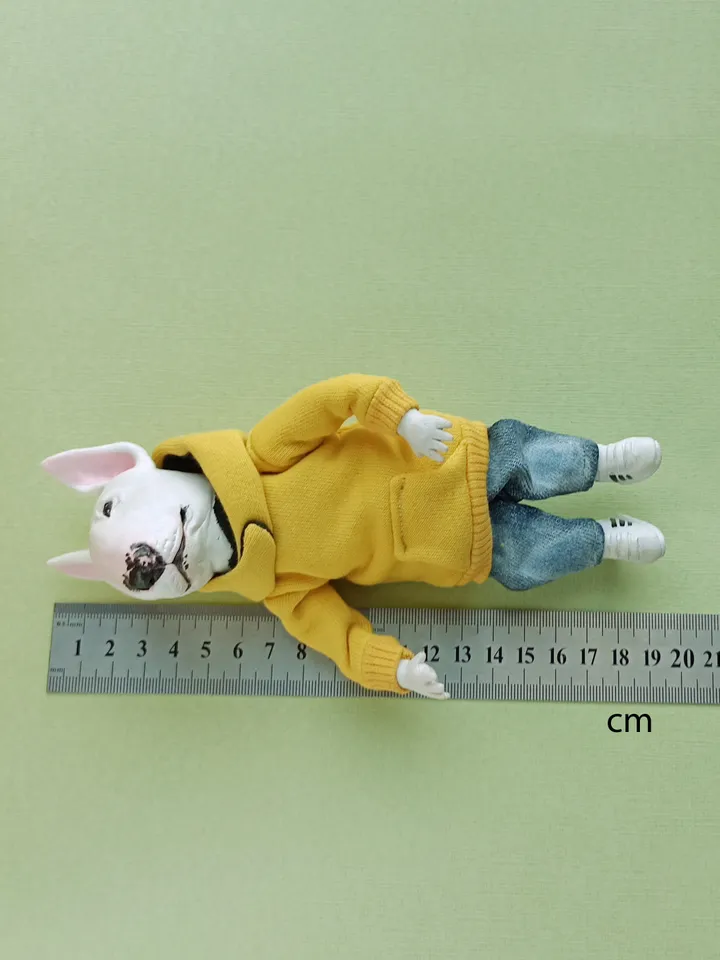Bull Terrier doll in a yellow sweater
