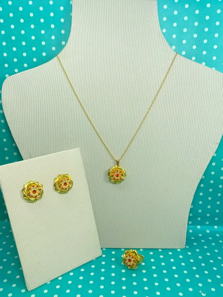 Set of jewelry with red rhinestones. Handmade. Jewelry.