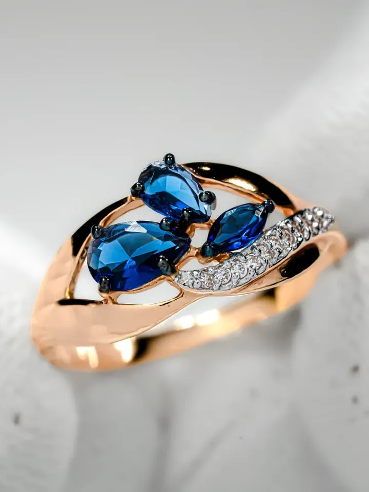 Ring Silver gold plated 925 assay value with sapphire