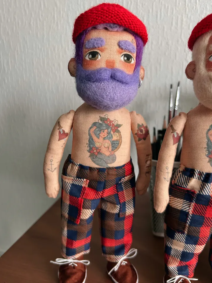 Textile doll sailor with purple beard