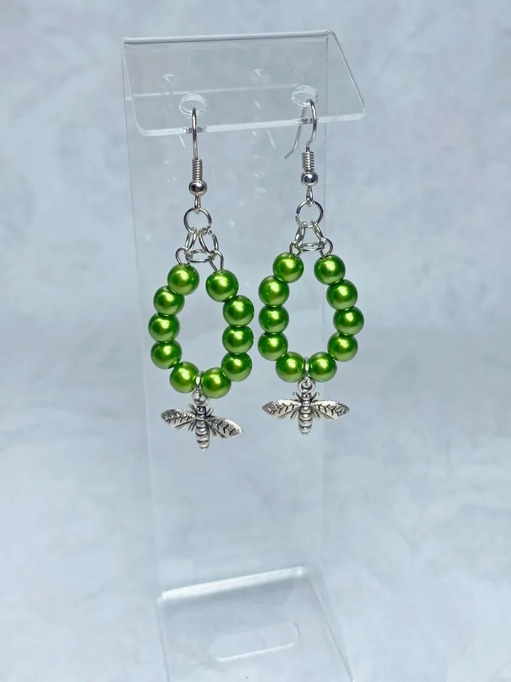 Earrings with green flies. Handmade jewelry.