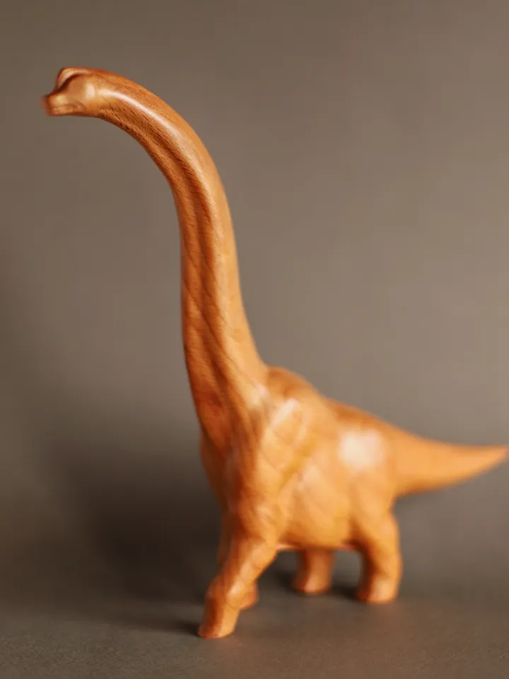 Wooden hand carved dinosaur brachiosaurus