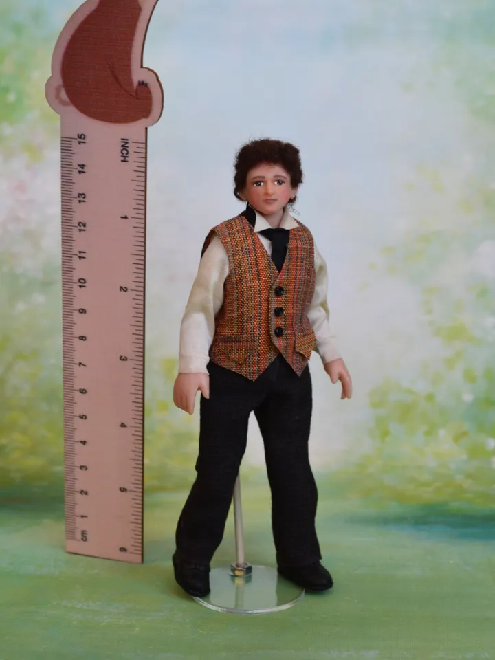 Miniature gentleman doll in 12 scale for a Victorian dollhouse.