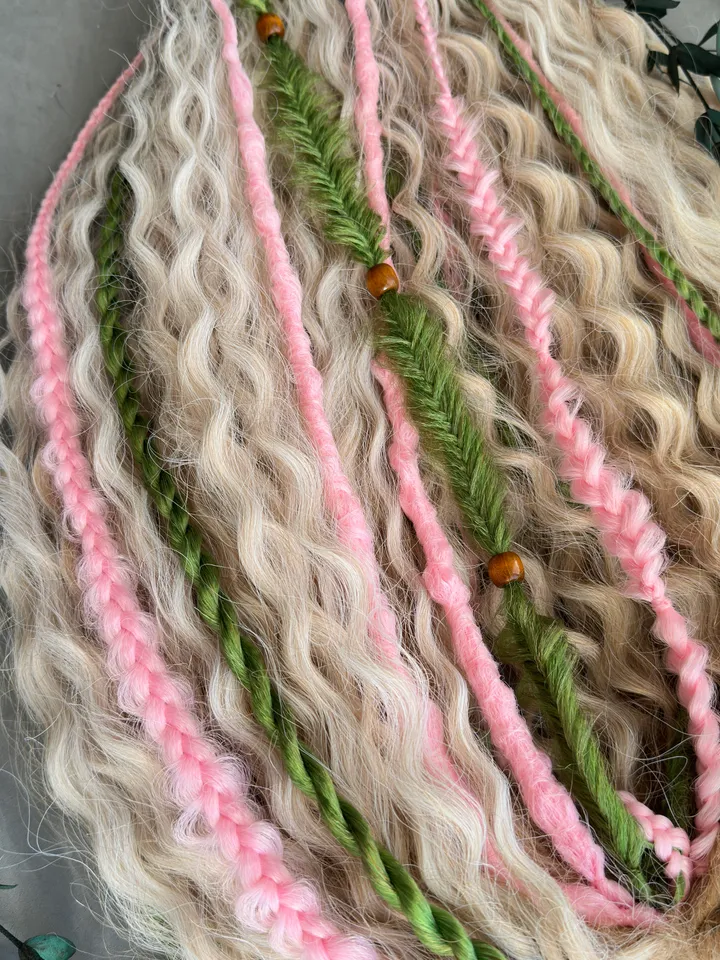 Curly dreads, green dreads, pink braids