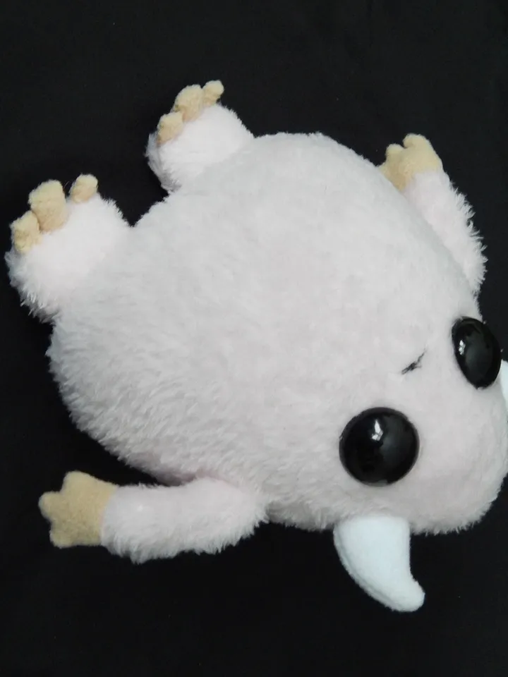 Cute pink fluffy monster toy