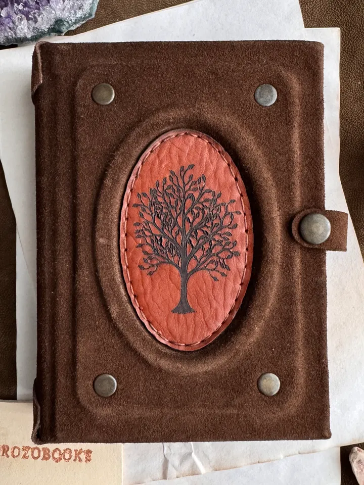 Notebook made of genuine suede with leather insert and wood engraving.