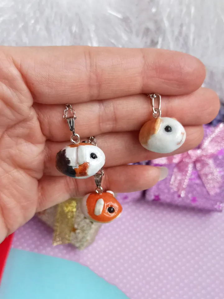 a Cute Guinea pig ball necklace in random color  (US discount)