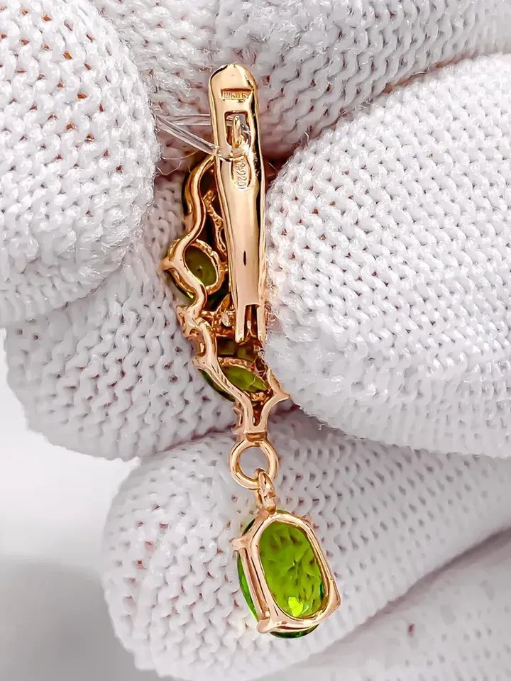 Earrings made of 925 silver (585 gold coating) long with chrysolite and cubic zirconia