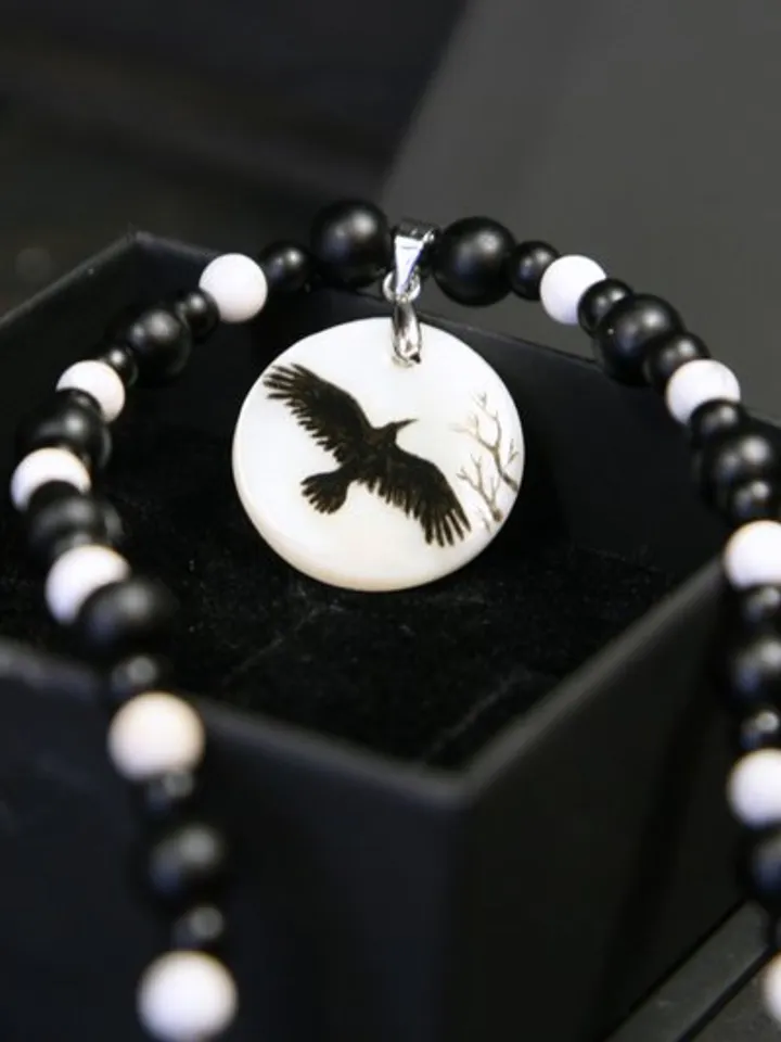 Raven or crow necklace with love rune on the other side. Nacre pearl pendant