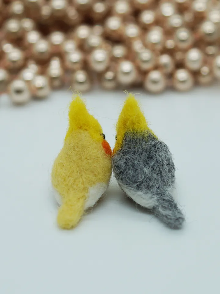A pair of tiny needle felted miniature cockatiels, made to order