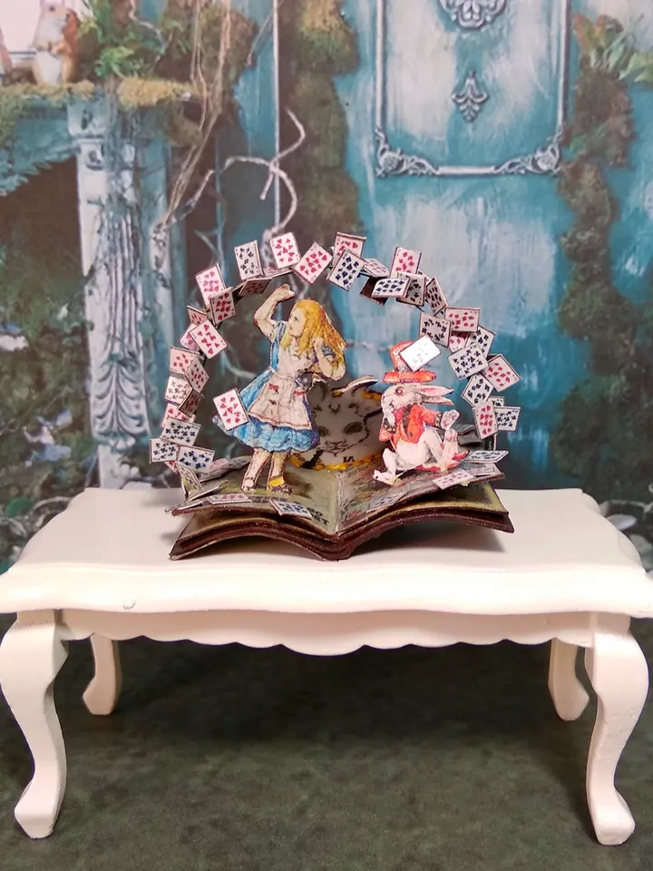 Open book. Dollhouse miniature.Miniature for a dollhouse.1:12 scale.