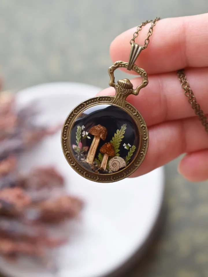 Pendant mushrooms in resin. Necklace with real mushrooms. Necklace with a forest composition.
