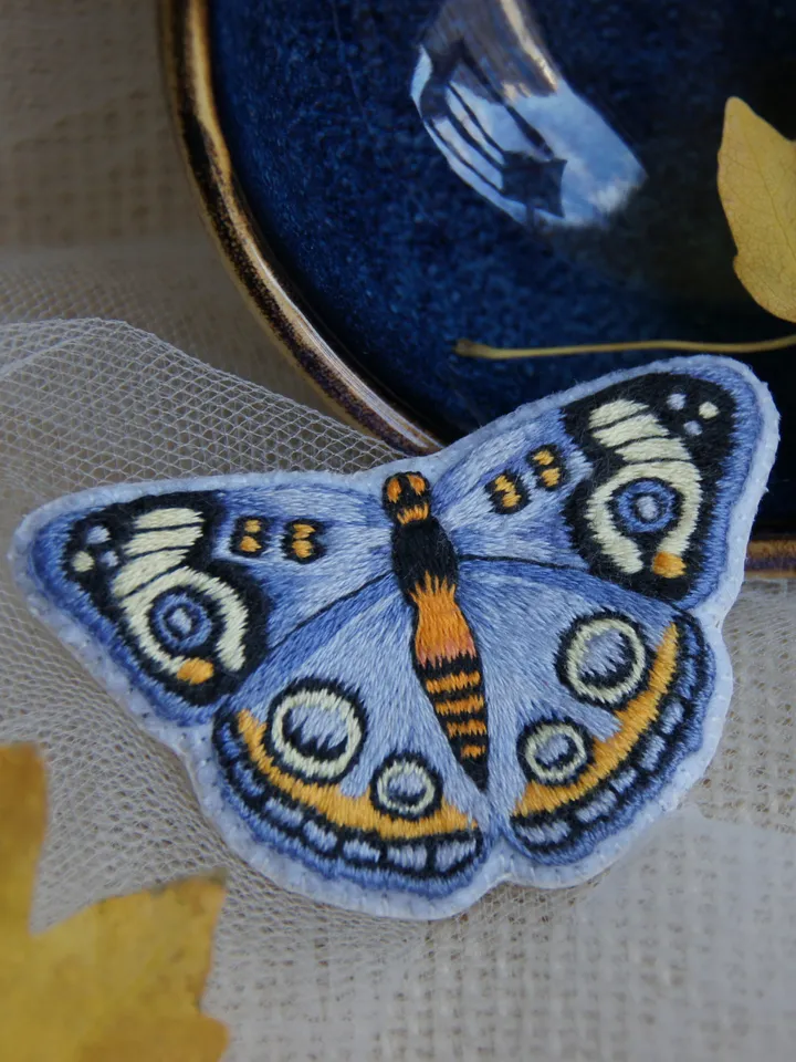 Butterfly Brooch. Embroidered pin brooch. A brooch in the shape of a butterfly.