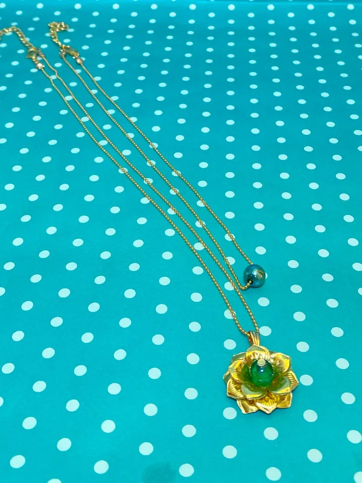 Pendant on a chain for the neck. Handmade jewelry.
