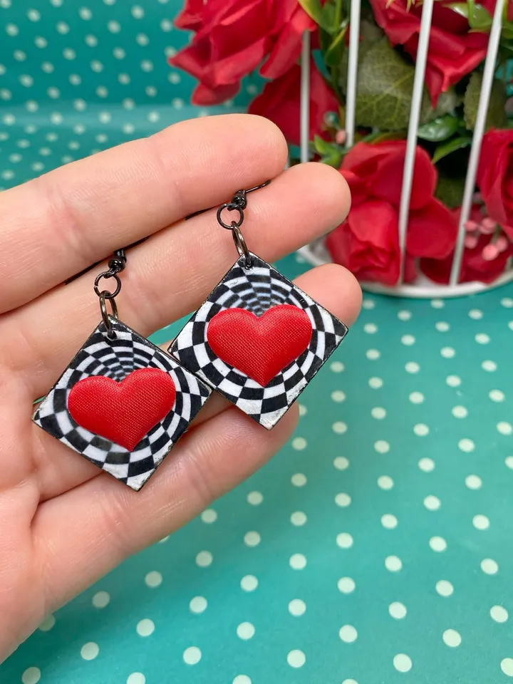 Bright handmade earrings. Handmade jewelry. Author's design. Earrings with bright hearts.