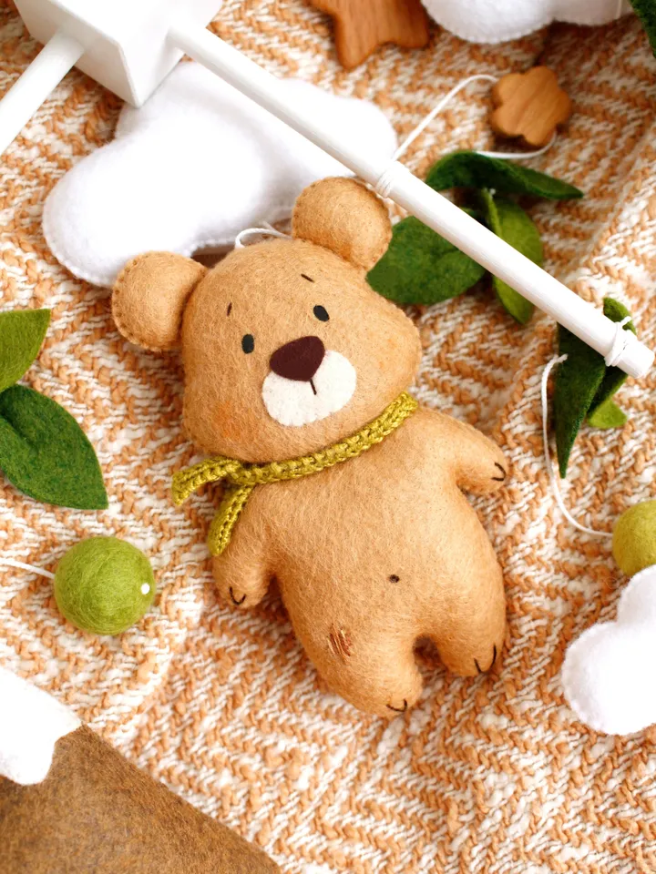 Felt woodland bear with clouds, spruce tree and mountain baby crib mobile hand sewing PDF tutorial with patterns. DIY forest nursery baby cot decoration