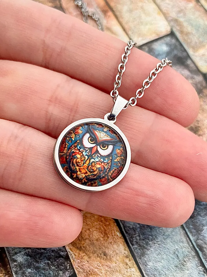 Owl, steel pendant with glass