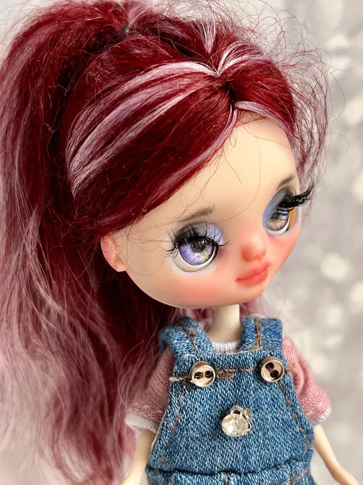 Petite Blythe doll with burgundy hair. Miniature doll with beautiful eyes.