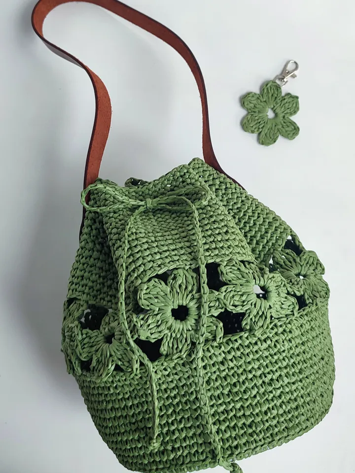 Green bag made of natural Rafia, crochet bag with a floral pattern, belt of bags made of genuine leather