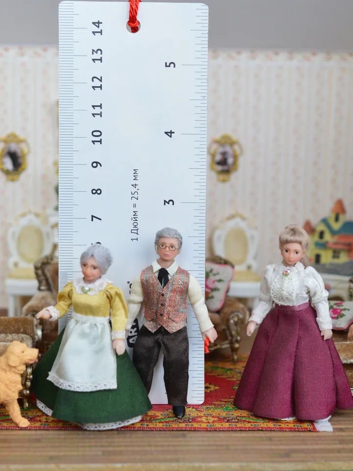 Man doll in 1/24 scale. Miniature doll for a dollhouse.