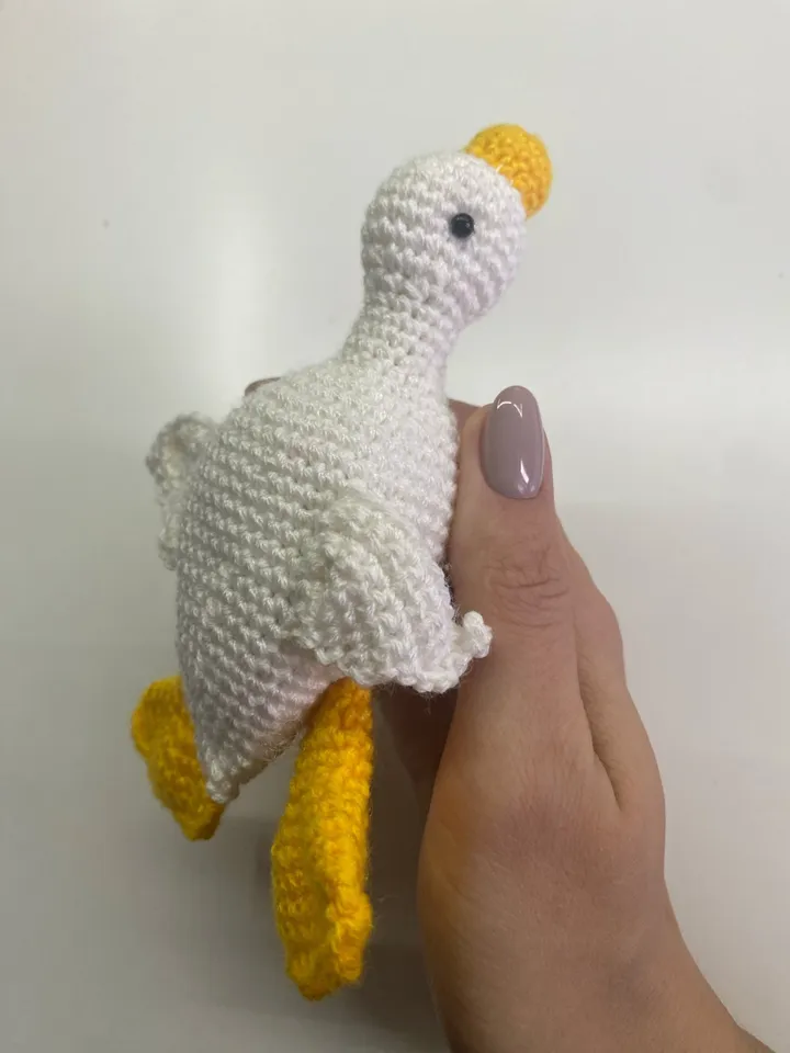 Doll with a goose crochet pattern