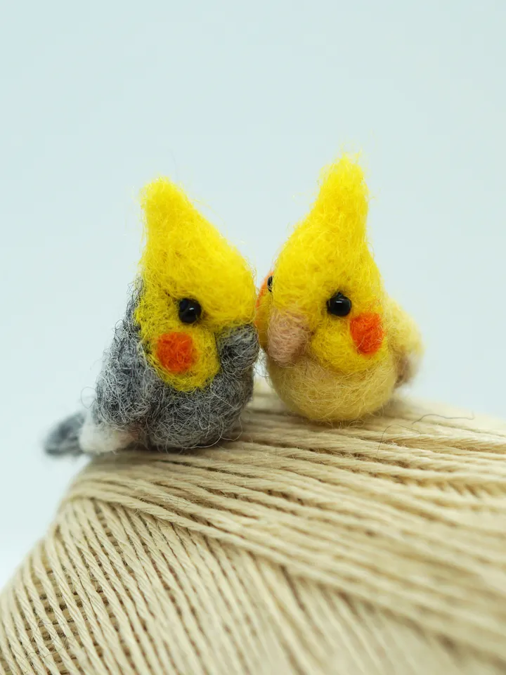 A pair of tiny needle felted miniature cockatiels, made to order