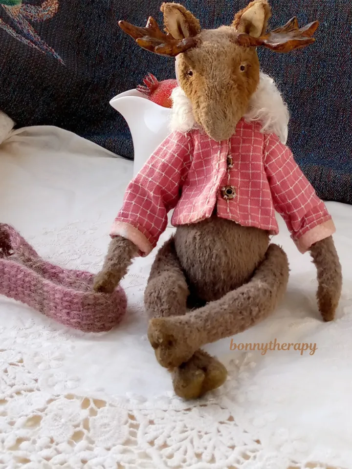 Teddy moose, cuddly plush elk in teddy style 6.6 inches sitting.