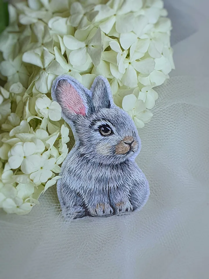 Tiny Bunny Brooch. An embroidered brooch in artistic satin stitch.