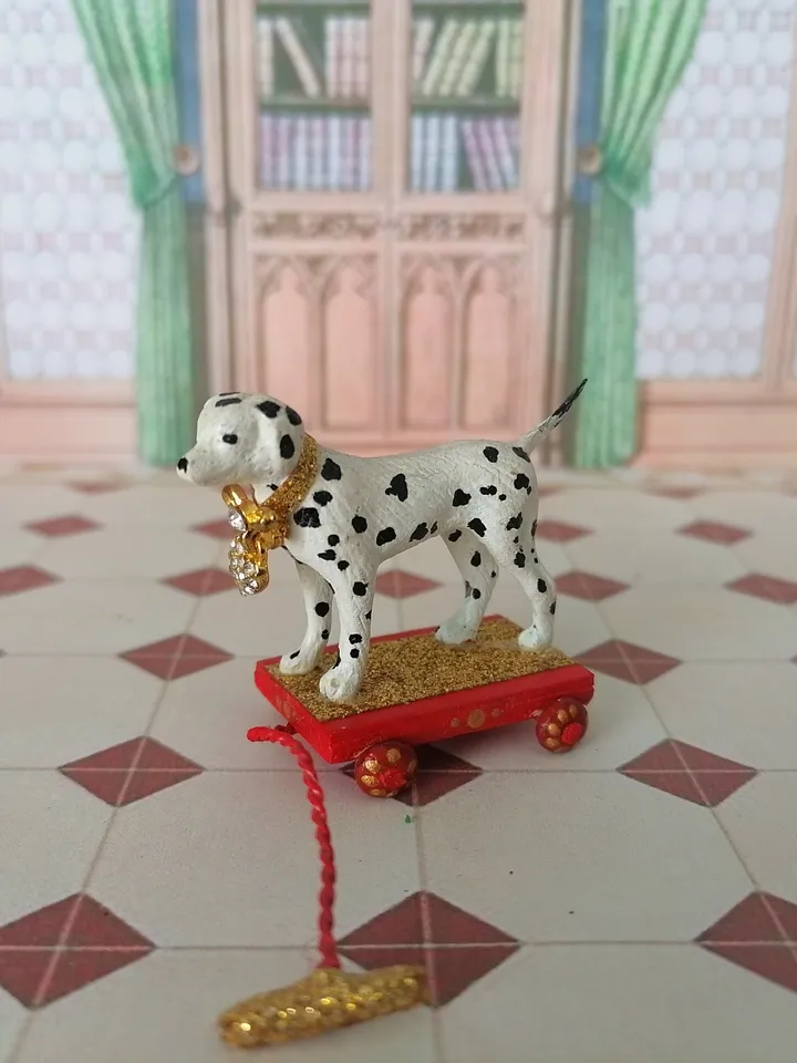 Dolmatian on a cart. Doll toy. dollhouse miniature.1:12 scale.