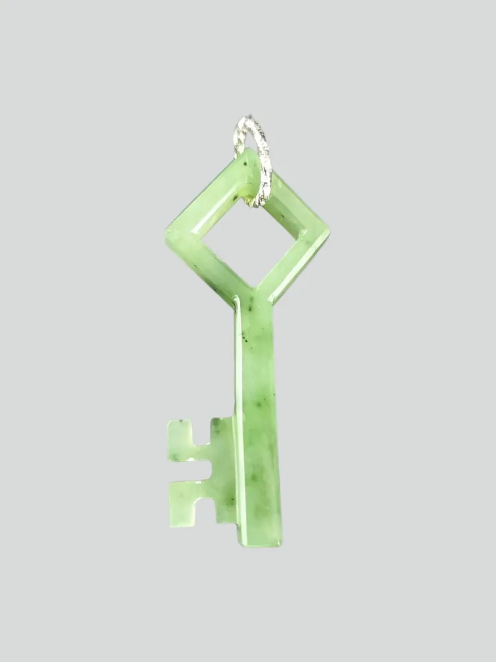 Skeleton green jade key good luck charm pendant.