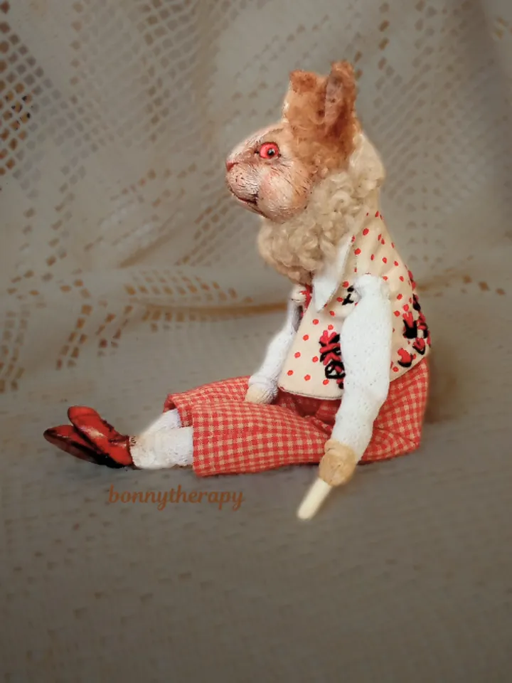 quirky bunny 5.1 inches sitting, made in mixed media.