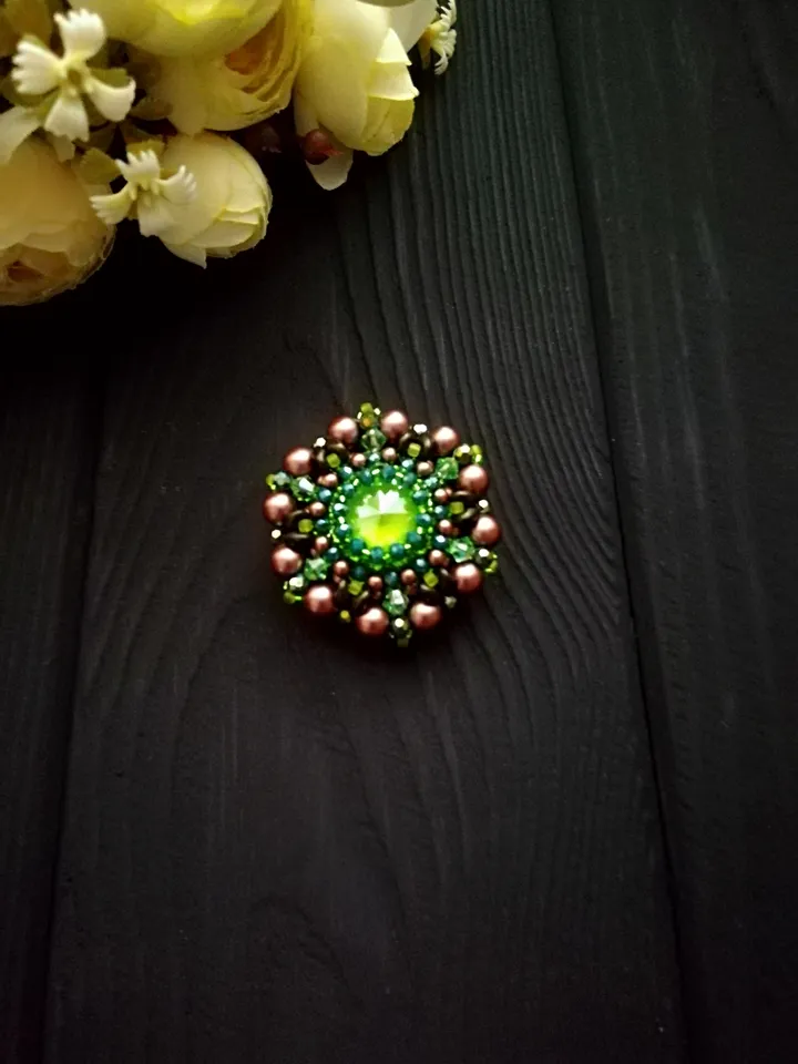 Green round bead brooch