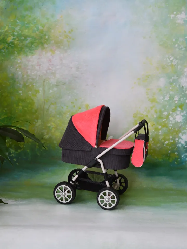 Miniature toy stroller for Barbie dolls.