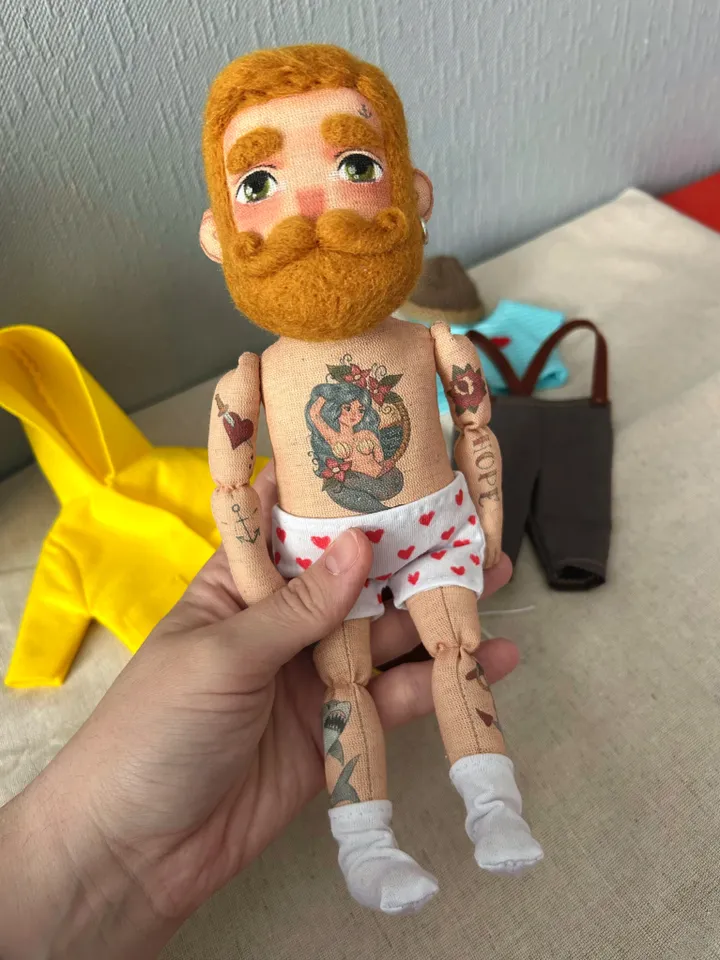 Textile doll sailor with yellow hair