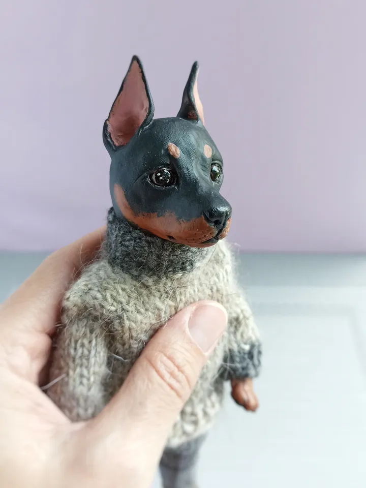 a doberman pinscher doll