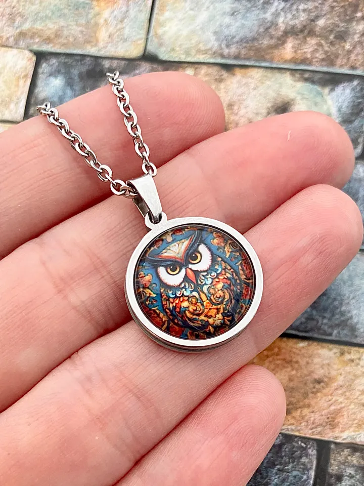 Owl, steel pendant with glass