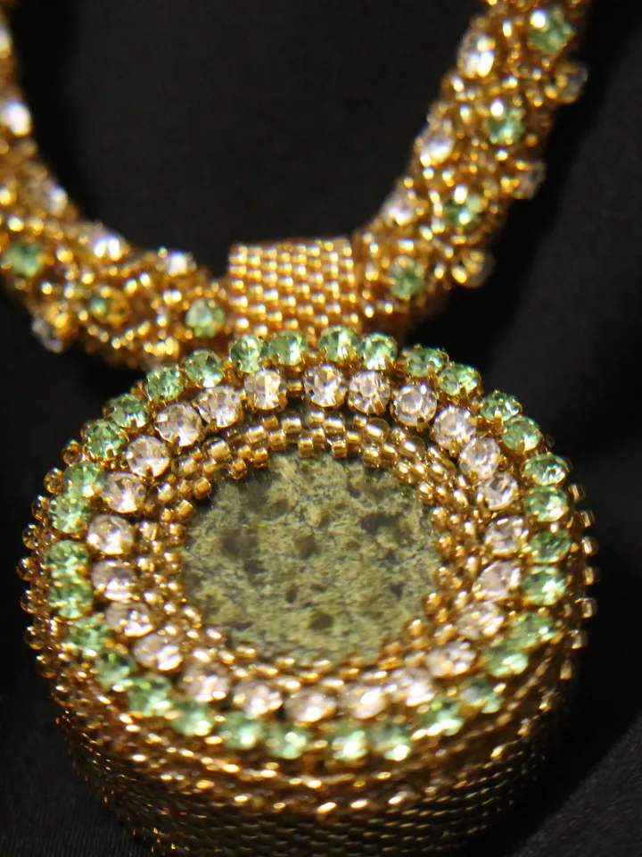 Pendant Japanese beads with a coil and rhinestones