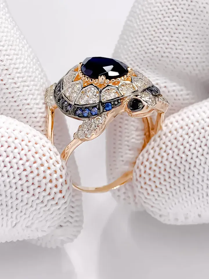 Ring Silver gold plated 925 assay value with sapphire