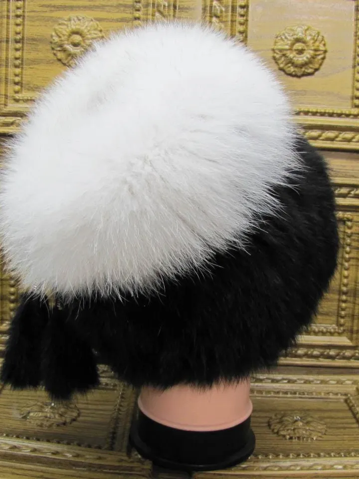Women's fur hat made of natural rabbit fur. Rabbit hat with arctic fox. Women's winter hat, fur accessory. Rabbit and arctic fox fur.