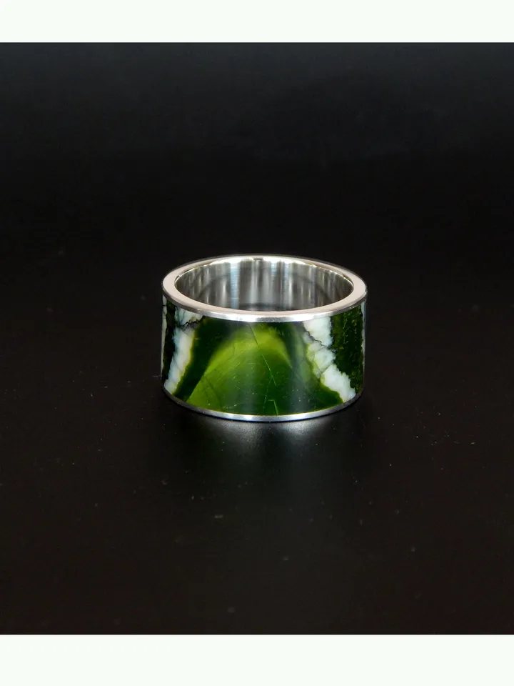Ring stabilized mammoth molar. Unique mammoth tooth ring.
