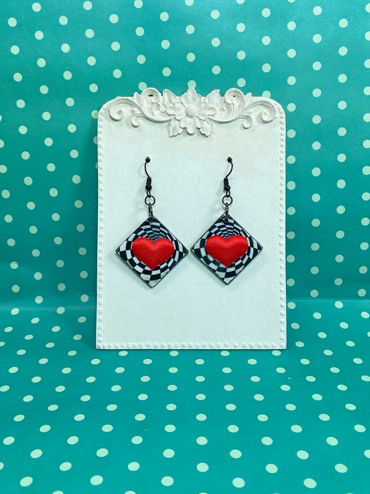 Bright handmade earrings. Handmade jewelry. Author's design. Earrings with bright hearts.
