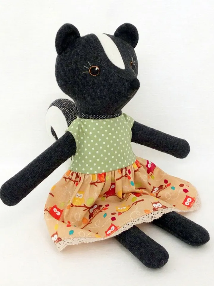 Black skunk girl, stuffed wool plush toy, handmade skunk fabric doll